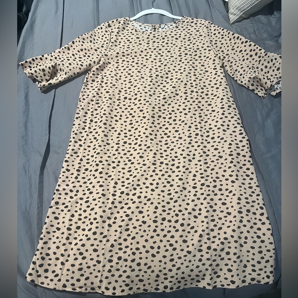 Printed dress, button back. Never worn